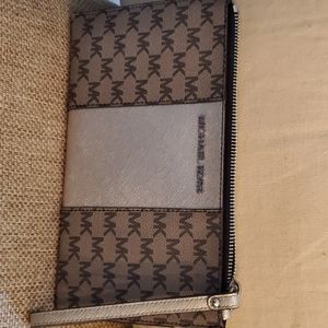 • Michael Kors Stripe wristlet